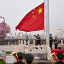 Soldiers raise the flag for the National Day at the Tian'anmen Square in Beijing, October 1, 2017 Source: Xinhua