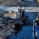 Student scientists and instructors test the water quality in Boone Creek, a waterway that travels through Appalachian’s main campus. Plans to daylight the creek are part of a larger resiliency initiative. Photo by Marie Freeman