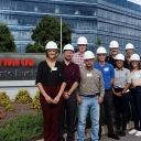 The HR Science Research Team visits Eastman Chemical Co.’s facility in Kingsport, Tennessee, in September 2018 to meet with their project collaborators. The team also toured the facility, hard hats and all, allowing them to meet the people who carry out and are affected by safety protocol and gain a better understanding of the conditions in which they work. Pictured, from left to right in the front row, are IOHRM graduate students Lauren Ferber ’16 and Matthew Laske; Dr. Yalçin Açikgöz, assistant professor