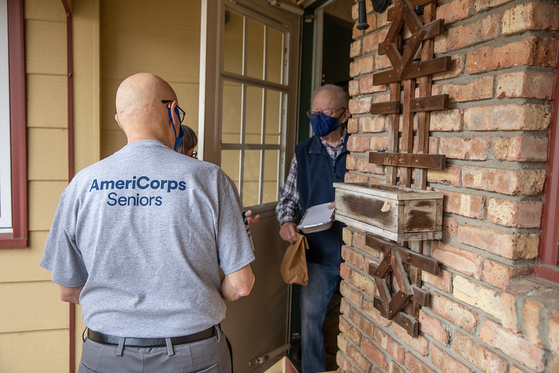 image of AmeriCorps members & AmeriCorps Seniors Volunteers. Photos by Americorps.