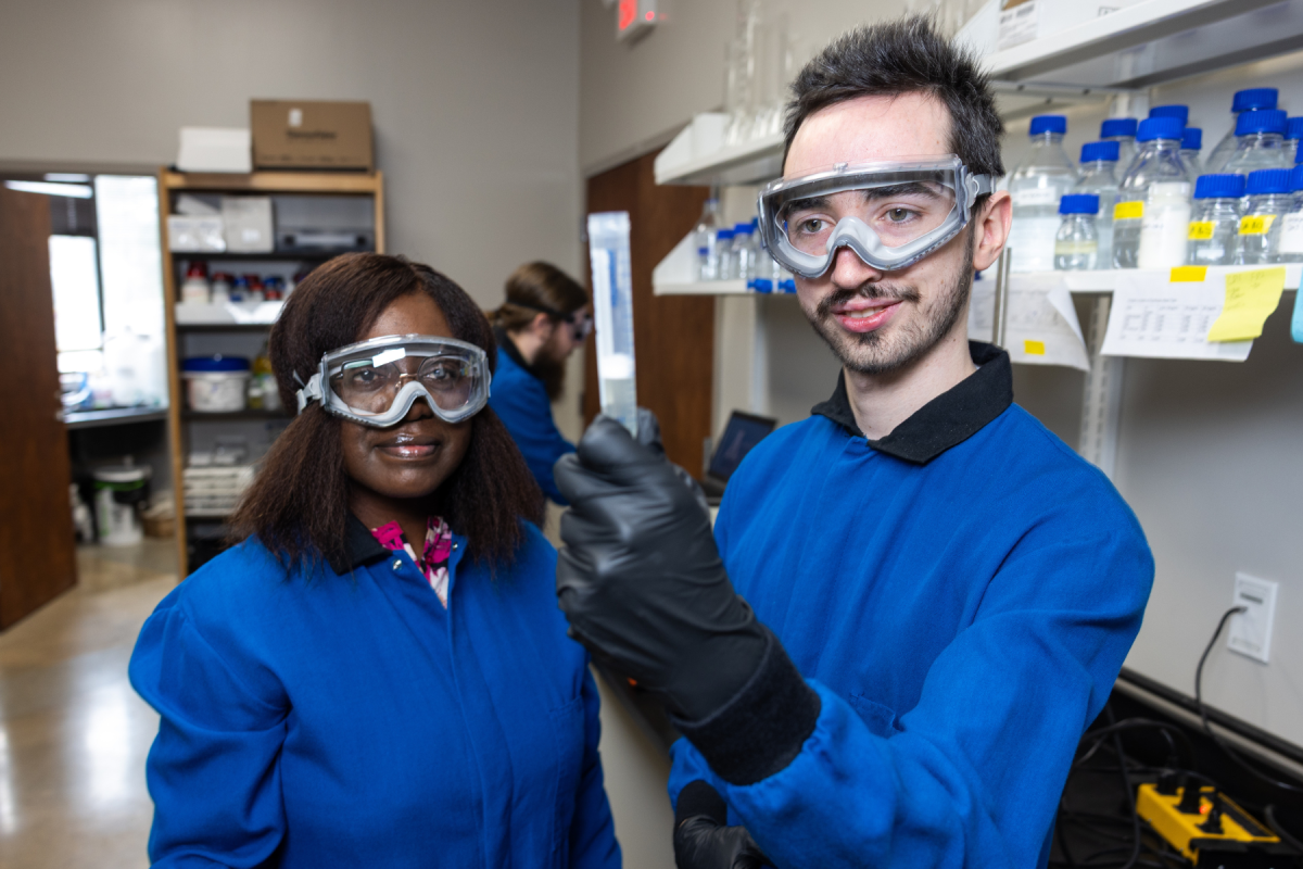 Dr. Nancy Asen and App State senior Jack Kelly examine a sample in the lab to understand foundational properties of oil seed waste and its potential to yield new edible protein sources through fermentation. Photo by Chase Reynolds