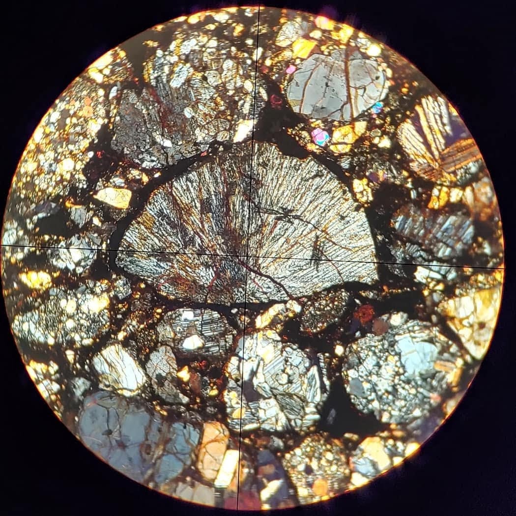 Barred Olivine from a meterorite in cross-polarized light