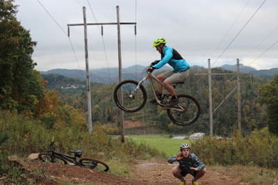 Ben Dannemiller on bike, jumping over a friend during his time at Appalachian. Photo submitted