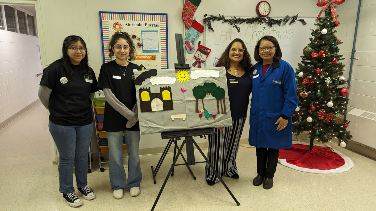 Sophomore chemistry majors Masa Al Horani (left) and Karen Rivera (second from left) and Appalachian State's Chief Diversity Officer Dr. Jamie Parson (third from left) assisted Dr. Cartaya-Marin (fourth from left) with the activity. Photo by Dr. Howard Neufeld.
