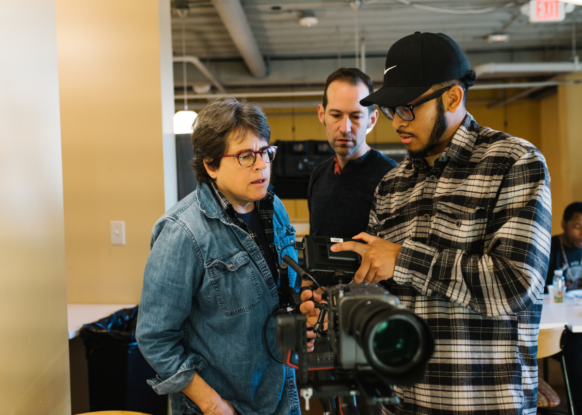 Davison, Department of Communication lecturer Ryan Witt, and Department of Communication alumnus Maleek Loyd '18 filming the documentary "A Place at the Table" in Raleigh. Photo submitted.