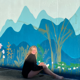 Mary Carver Deal painting the mural outside of Appalachian Brian Estates. Photo submitted.