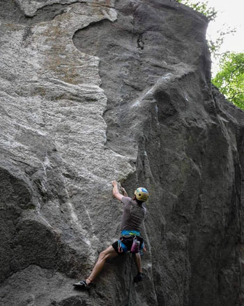 Photo of Carpenter rock climbing during his time at Appalachian. Photo submitted