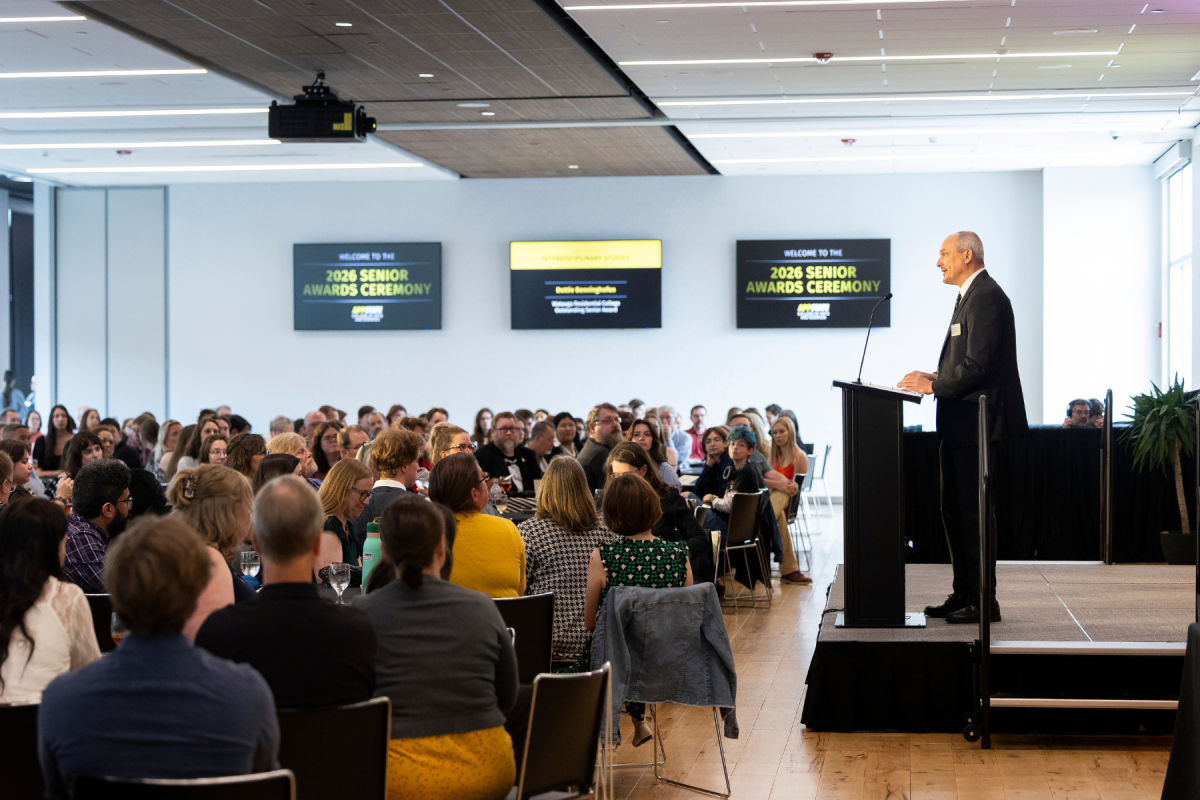 Dr. Mike Madritch, dean of the College of Arts and Sciences, addresses a packed Grandview Ballroom during the college's 2025-26 Senior Awards Ceremony on Friday, April 24, 2026. Photo by Kyla Willoughby