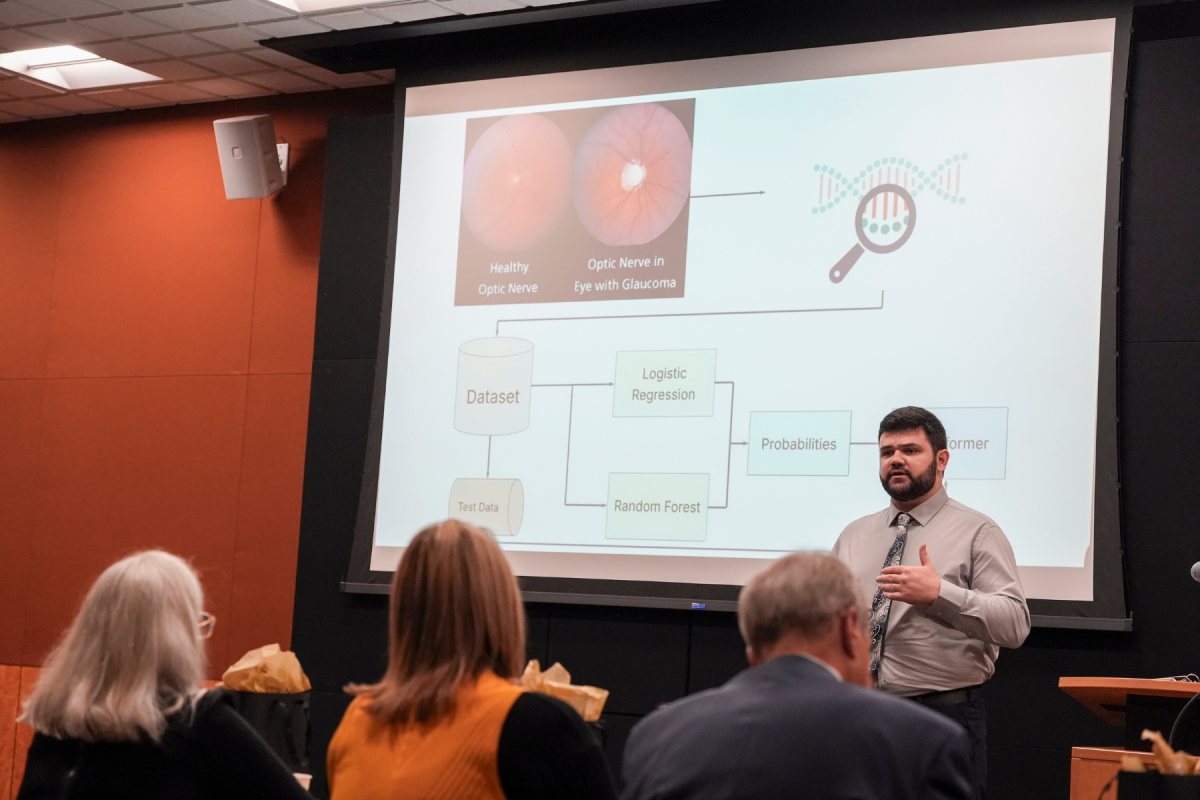 Michael Sciole &rsquo;24, a graduate student in the Computer Science program, presents his thesis, "Transemble: A Transformer Ensemble Network for Detecting Retinal Ganglion Cell Types," at App State's 14th annual Three Minute Thesis competition on Friday, November 21, 2025. Photo by Troy Tuttle