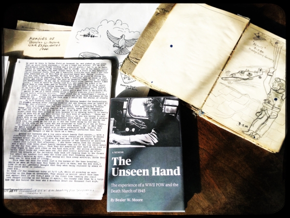 “The Unseen Hand” book cover alongside Bealer Moore’s sketchbook and memoir. Photo submitted.