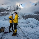 Dr. Baker Perry, professor in Appalachian State University’s Department of Geography and Planning, right, and his expedition team member Dr. Tom Matthews, work on the automated weather station at the Mount Everest Base Camp. Perry and Matthews were members of the 2019 National Geographic and Rolex Perpetual Planet Everest Expedition. Learn more at www.natgeo.com/everest. Photo by Freddie Wilkinson, National Geographic.
