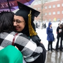 After the morning ceremony, graduating Appalachian State University senior Razan Farhan Alaqil embraces Traci Royster, director of staff development and strategic initiatives for Appalachian’s Division of Student Affairs, outside of the Holmes Convocation Center. Photo by Chase Reynolds