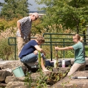 Dr. Shea Tuberty, professor and assistant chair in Appalachian’s Department of Biology, far left, works with biology graduate students Grant Buckner, of Burnsville, center, and Cristina Sanders, of Taylorsville, to check water samples from a creek in Durham Park on campus just before the flooding associated with Hurricane Michael took place. Photo by Marie Freeman