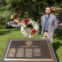 Dr. Seth Grooms, Marine Corps veteran and App State assistant professor, placed a wreath at the Veterans Memorial on the Boone campus during the university’s annual Memorial Day commemoration on Friday, May 26. Photo by Chase Reynolds