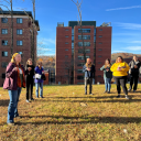 App State's Dr. Alice Wright, associate professor of anthropology, far left, Dr. Susan Keefe, App State professor emerita of anthropology, second from left, and Roberta Jackson ’91, lead facilitator of the Junaluska Heritage Association, welcome volunteers to the Boone Cemetery in 2022, where they helped place stones over unmarked graves of Black individuals. Photo submitted