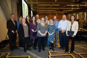 CAS faculty and staff award winners for 2017-18 (l to r): Timothy J. Smith, Alice P. Wright, Dean Neva J. Specht, Allison Fredette, Heather Custer, Andrew Heckert, Sandy Hicks, German Camps-Munoz, Carmen Scoggins, Richard Gray, Joseph Gonzalez and Ellen Lamont.