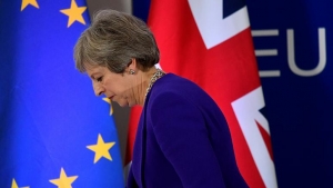 British Prime Minister Theresa May leaving the European Union summit in Brussels in October 2018, where the two sides failed to reach an agreement on Brexit. Image Source: Euronews