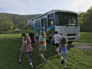 An excited group of third graders participating in the 