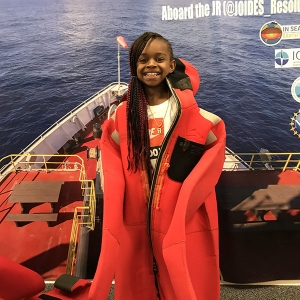 A student at the Appalachian State University Academy at Middle Fork tries on a survival suit worn during Antarctic research expeditions through Appalachian’s Picture Yourself as a Geologist (PYES) outreach program. Photo submitted