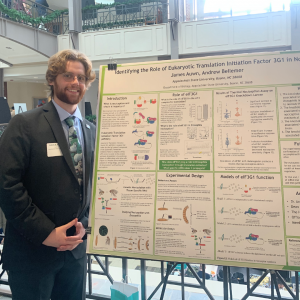 James Auwn presenting his research on the role of translation initiation factors in the development of sensory neurons that transduce harmful stimuli at the State of North Carolina Undergraduate Research and Creativity Symposium in December, 2022. Photo submitted