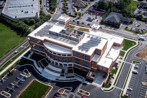 This aerial photo shows the rows of photovoltaic (PV) panels installed atop Appalachian’s Leon Levine Hall of Health Sciences. Photo by Marie Freeman