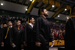 Graduates process into Appalachian State University’s Holmes Convocation Center during Fall 2019 Commencement Dec. 13. Photo by Chase Reynolds