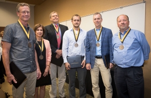 Winners of the 2018 Appalachian Excellence in Teaching Awards at the Fall Semester Faculty and Staff Meeting. From left: Dr. Thomas Whyte, professor in the Department of Anthropology; Dr. Susan Staub, professor in the Department of English; Dr. Richard Pouder, professor in the Department of Management; Dr. Gabriele Casale, associate professor in the Department of Geological and Environmental Sciences; Dr. William “Bill” Anderson, professor in and chair of the Department of Geological and Environment Science