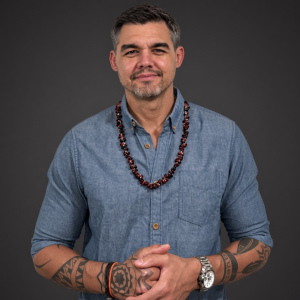 A man wearing a blue shirt.