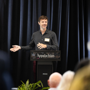App State alumnus Tommy Guy ’07 shares remarks at the 2024 Appalachian Scholarship Celebration as the featured donor speaker. Guy is a graduate of the College of Arts and Sciences — holding degrees in religion and philosophy and mathematics — and has established multiple scholarships within the college. Photo by Chase Reynolds
