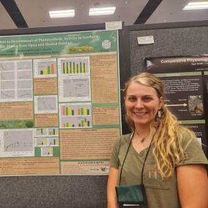 Leigha Henson, biology graduate student from Griffin, Georgia, received a 2023 LI-COR Prize at the Botanical Society of America's Botany Conference in Boise, Idaho, for her poster "Light and Moisture Content as Determinants of Photosynthetic Activity in Southern Appalachian Mosses from Open and Shaded Habitats." Photo by LI-COR Environmental on LinkedIn