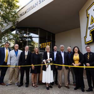 App State Chancellor Sheri Everts, center, cuts the ribbon on the new App State Hickory campus on Aug. 21. Pictured with Everts, from left to right, are App State Student Body President Juan Pablo “J.P.” Neri, UNC System Board of Governors member Philip Byers, App State Trustee Jeff Chesson, App State Board of Trustees Chair Kim Shepherd, Catawba County Economic Development Corporation President Scott Millar, App State Board of Trustees Secretary Tommy Sofield, Hickory Assistant City Manager Rick Beasley, A