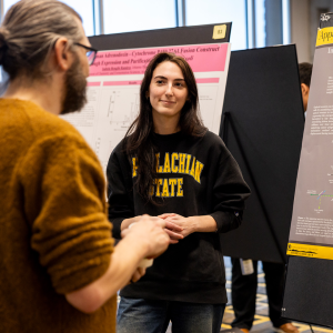This year’s Celebration of Student Research and Creative Endeavors will be the largest in App State history, with 240 students participating. Pictured, an App State student presents their research poster during last year’s event. Photo by Kyla Willoughby