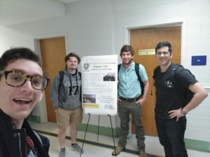 Department of Computer Science staff member and students pictured left to right: Michael Dougherty (coach), students Dylan Beasley, Jackson Sippe and Andrew Thorp