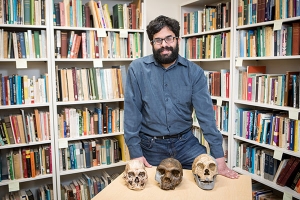 Appalachian State University’s Dr. Marc Kissel, with model skulls. Photo by Marie Freeman
